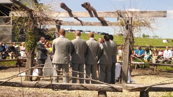 The ceremony area included a beautiful rustic altar area as well as wooden benches.