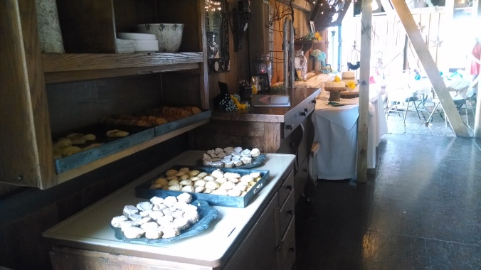 Here is the cookie and cake area. (Although cookies were beautifully displayed all throughout the venue on old pianos and bureaus.) The far end where you see the ladder actually leads UP to where the DJ played from. There was also a galvanized bucket hanging to submit your requests. :-)